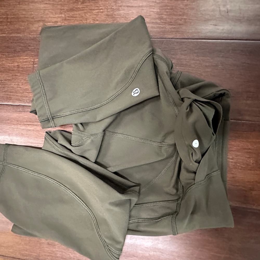Lululemon Time to Sweat tights. Size 2. Olive green.  Great shape.